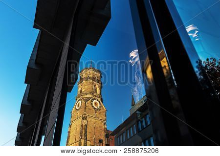 The Stiftskirche In Stuttgart, Germany, Reflecting In A Shop Window