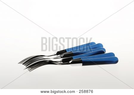 Besteck mit blauen griffen