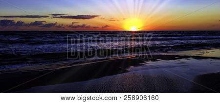 Sunset On Polish Coast With Visible Sun Rays - Baltic Sea In Lubiatowo, Pomorskie, Poland