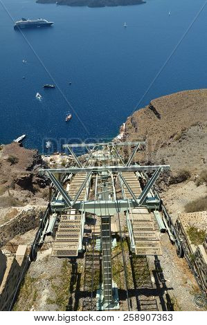 Cableway Wagons Going Down To The Port On The Beautiful Island Of Santorini. Architecture, Landscape
