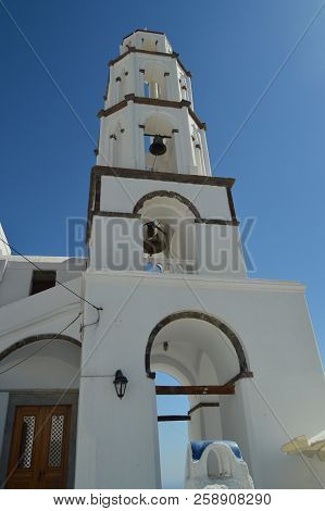 Bell Tower Of The Beautiful Church Of Pyrgos Kallistis On The Island Of Santorini. Travel, Cruises, 
