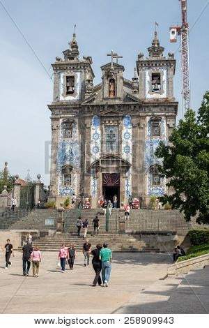 Porto, Portugal - September 16, 2018 : Pilgrims And Tourists Visit The Church Of Santo Ildefonso, Wh