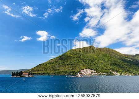 Blue Sky Over The Our Lady Of The Rock And The Sveti Dordje Churches On Neighboring Islands In The B