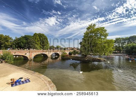 Stratford-upon-avon, United Kingdom - August 24: An Unidentified Woman Relaxes At The River Avon In 