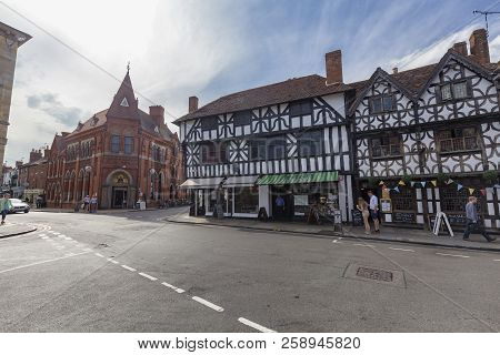 Stratford-upon-avon, United Kingdom - August 24: Unidentified People Walk Past Traditional Architect