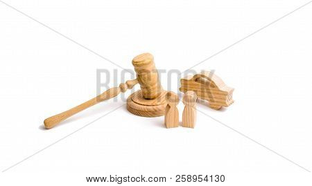 Wooden Figurine Of A Car With People In A Hammer Of The Judge On A White Background. Minimalism. Pur