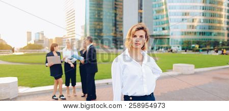 Business Lady With Close Up Face Looking At Camera In   And Empl