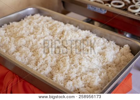 Steam Rice Served For Buffet, Catering Service On Celebration. Steamed Rice In Pan Closeup. Traditio