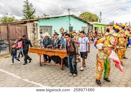Parramos, Guatemala - December 28, 2016: Traditional Folk Dancers In Mask & Costume Perform Dance Of