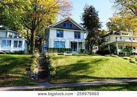 Bay View, Michigan / United States - October 17, 2017: A Concrete Stairway Leads To An Elegant Two S