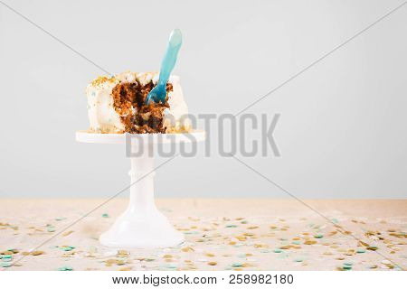 Damaged Birthday Cake With Spoon. Birthday Party Celebration And Messthetics Concept. Horizontal, Gr