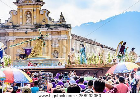 Antigua, Guatemala -  March 29, 2018: Holy Thursday Procession & Hermano Pedro Church In Colonial To