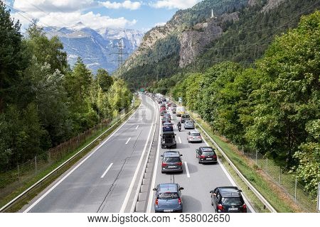 Rothenbrunnen, Switzerland: 12 August 2018 - Weekend Traffic Jam On The Highway Towards Swiss Alps C