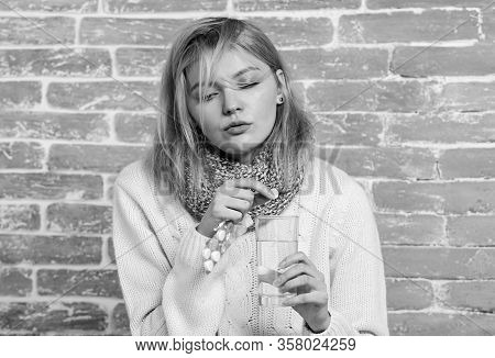 Take Medications To Reduce Fever. Woman Tousled Hair Scarf Hold Glass Water And Tablets Blister. Gir