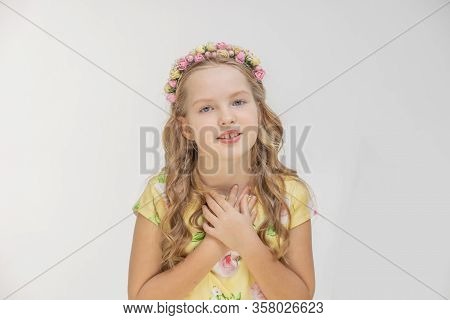 Girl Teenager Washed His Hands Over His Chest, His Heart. On A White Background