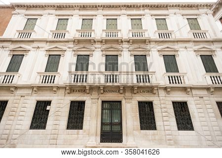 Venice. Italy - May 13, 2019: Facade of Banca Nazionale del Lavoro in Venice. Italy. Old Building.