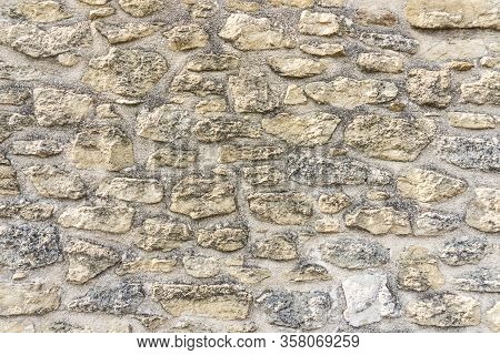 Rough Surface Of Random Pattern Rastic Of Brown And Light Yellow Color Natural Free Form Sand Stone 
