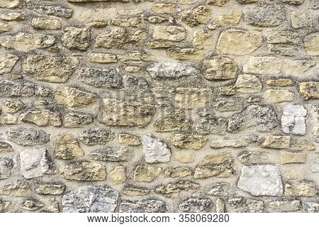 Rough Surface Of Random Pattern Rastic Of Brown And Light Yellow Color Natural Free Form Sand Stone 