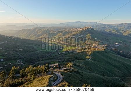 Sicilian Landscape With The City Of Calascibetta At Nice Early Sunset