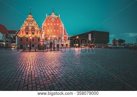 Riga, Latvia. Schwabe House And House Of The Blackheads At Town Hall Square, Ancient Historical Land