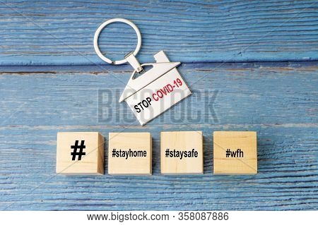 Concept Image A Wooden Block And Word - #wfh ( Work From Home, Stay Home And Stay Safe On Wooden Bac