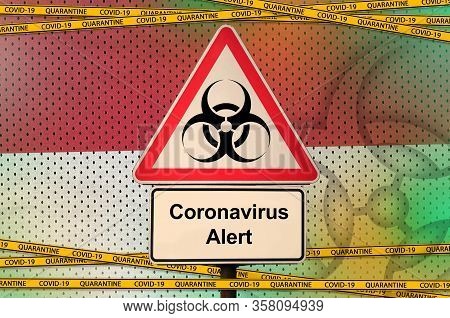 Indonesia Flag And Covid-19 Biohazard Symbol With Quarantine Orange Tape. Coronavirus Or 2019-ncov V