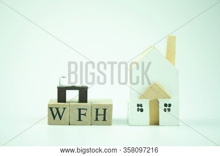 Wood Block Text Of Wfh It Mean Work From Home With Miniature Table And Wood Home. Work From Home Dur
