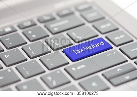 Tax Filing, Gst, Sst, Vat, Tax Return And Tax Refund Word On Keyboard For Taxation Related Legislati