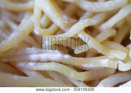 Spoiled Spaghetti With Mold. Pasta Or Noodles With White Penicillum Spores. Old Food Close Up Backgr