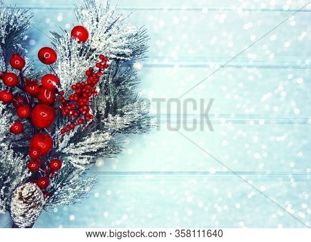 Winter Christmas Background With Fir Branches Cones And Snow On Blue ...
