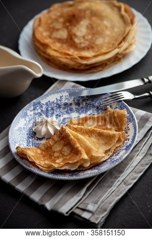 A Stack Of Thin Pancakes On A Plate. Homemade Pastries. Pancakes For Breakfast. Appetizing Food. Thi