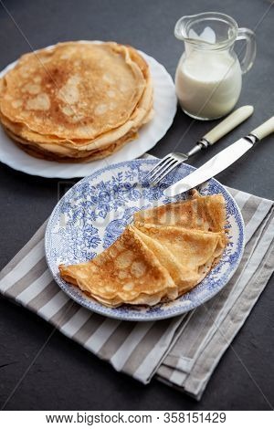 A Stack Of Thin Pancakes On A Plate. Homemade Pastries. Pancakes For Breakfast. Appetizing Food. Thi