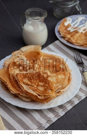 A Stack Of Thin Pancakes On A Plate. Homemade Pastries. Pancakes For Breakfast. Appetizing Food. Thi