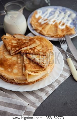 A Stack Of Thin Pancakes On A Plate. Homemade Pastries. Pancakes For Breakfast. Appetizing Food. Thi