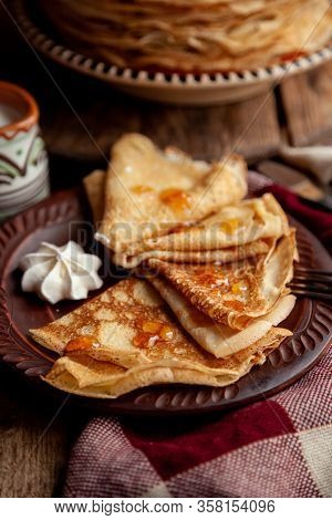 A Stack Of Thin Pancakes On A Plate. Homemade Pastries. Pancakes For Breakfast. Appetizing Food. Thi