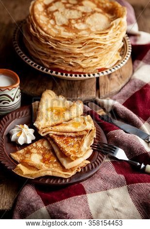 A Stack Of Thin Pancakes On A Plate. Homemade Pastries. Pancakes For Breakfast. Appetizing Food. Thi