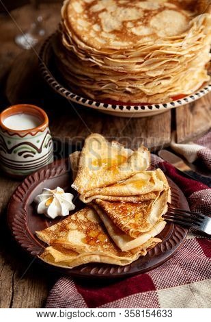 A Stack Of Thin Pancakes On A Plate. Homemade Pastries. Pancakes For Breakfast. Appetizing Food. Thi