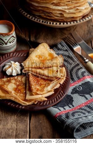 A Stack Of Thin Pancakes On A Plate. Homemade Pastries. Pancakes For Breakfast. Appetizing Food. Thi