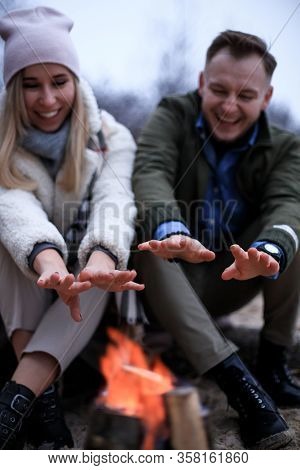 Winter Picnic On Baech With Bonfire. Love Story On Winter Foggy Sand Beach. Valentines Concept.
