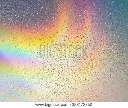 Water Drops On The Glass On A Bright, Colorful Background. Abstract, Soft Focus.