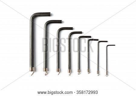 Hex Keys Of Different Sizes On A White Background