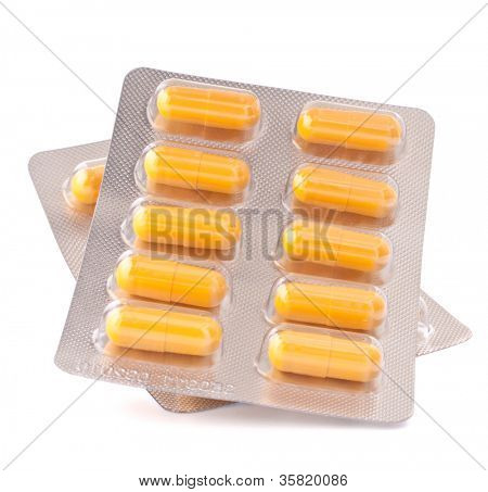 แผลพุพอง caplet medicament แยกต่างหากบนคัตเอาท์พื้นหลังสีขาว