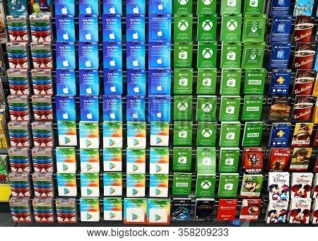 Montreal, Canada - March 22, 2020: A Stand With Gift Cards Of Different Services And Companies Such 