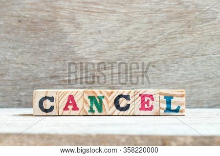 Letter Block In Word Cancel On Wood Background