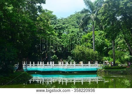 Manila, Ph - July 6: Bridge And Lake At Chinese Garden Inside Rizal Park On July 6, 2016 In Manila, 