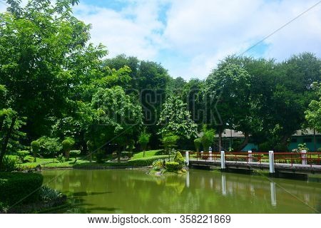 Manila, Ph - July 6: Bridge And Lake At Japanese Garden Inside Rizal Park On July 6, 2016 In Manila,