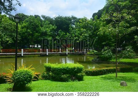 Manila, Ph - July 6: Bridge And Lake At Japanese Garden Inside Rizal Park On July 6, 2016 In Manila,