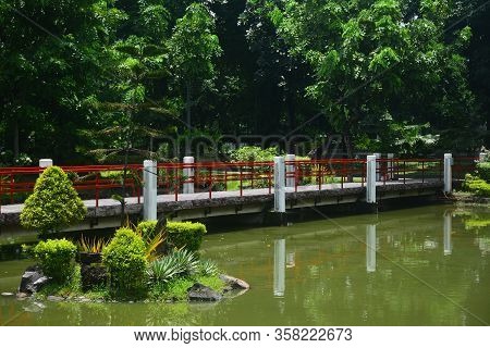 Manila, Ph - July 6: Bridge And Lake At Japanese Garden Inside Rizal Park On July 6, 2016 In Manila,