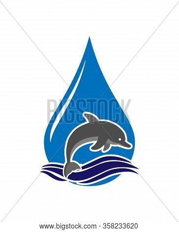 Dolphin Jumps Out Of The Waves Against The Background Of A Drop Of Water. Logo, Logo, Or Sticker For