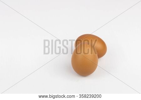 Raw Chicken Egg Isolated On White Background, Space For Text.